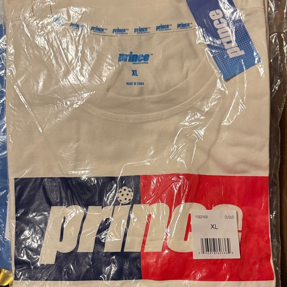 Prince Cream T-Shirt with Red and Blue Graphic